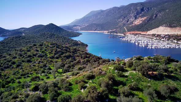 The top view from the drone of Kas resorts, bay, yahts, city in Mugla in Turkey