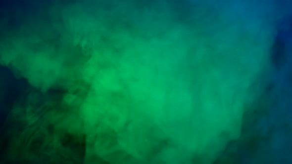 Abstract Green and Blue Smoke in Slow Motion
