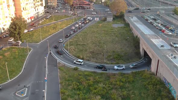 Heavy traffic on a crossroad in golden hour,ing up drone