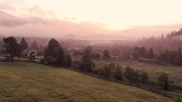 Foggy Sunny Morning in Mountain Village