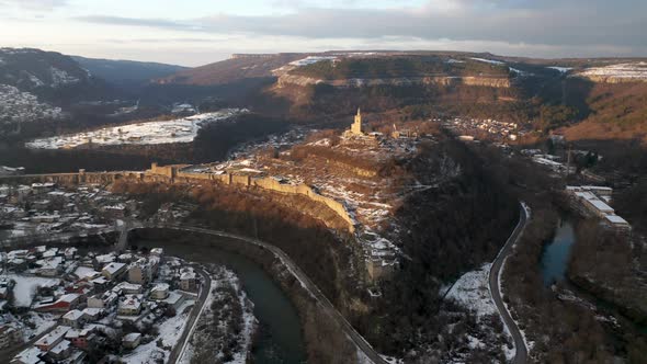 Aerial video above a hill with an old fortress