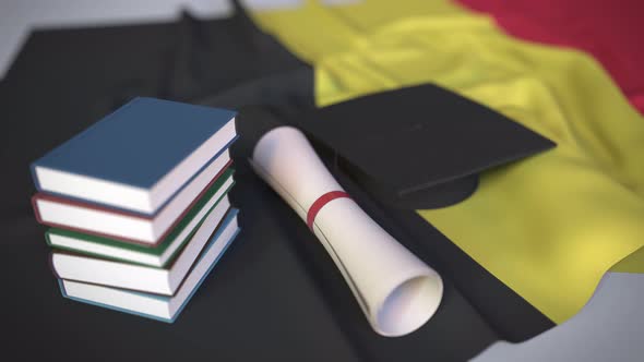 Graduation Cap and Diploma on the Flag of Belgium