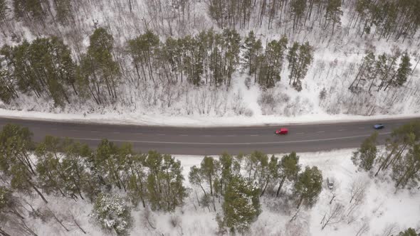 Aerial View Winter Road Near The Forest