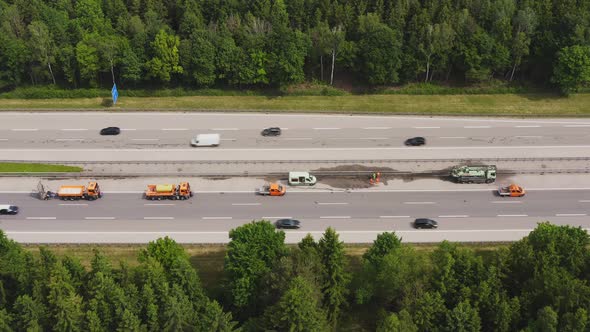 Construction aera at a german motorway - time lapse of fast driving cars next to the construction si