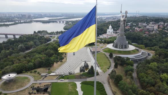 Kyiv - National Flag of Ukraine By Day. Aerial View. Kiev. Slow Motion