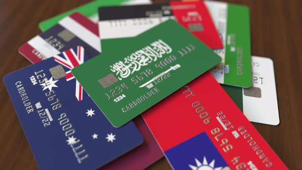 Emphasized Bank Card with Flag of Saudi Arabia