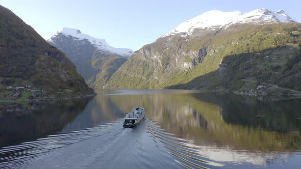 Norwegian Fjord with a Vehicle and Passenger Ferry