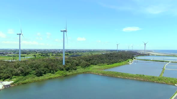 The wind turbine is located by the sea