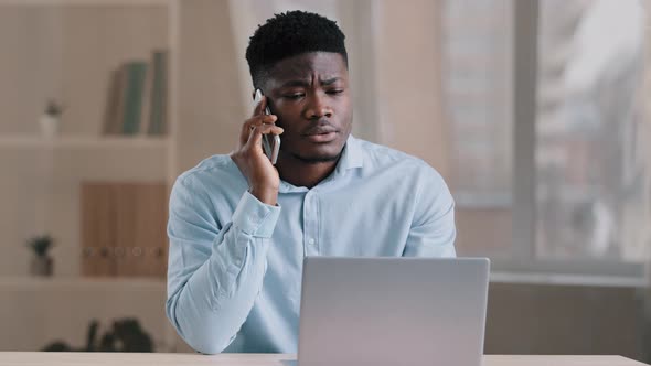 African American Man Businessman Freelancer Worker Talk Chatter on Mobile Cellphone with Client Make