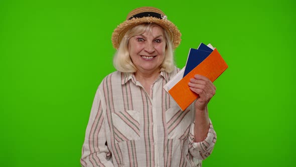 Traveler Tourist Senior Woman Holding Passport Tickets Dreams of Which Country Go Rest on Vacation