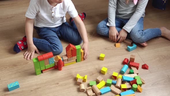 Two Happy Preschool Siblings Children Boy Girl In Playing Room