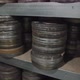Archive of shelves with оld round metal boxes with film strip in them. - VideoHive Item for Sale