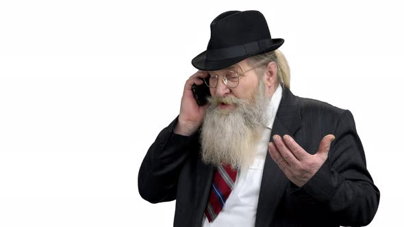 Mature Man Talking on Mobile Phone