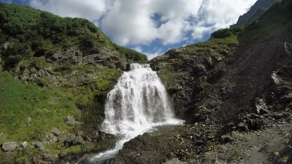 Beautiful waterfall in mountains of Kamchatka Peninsula