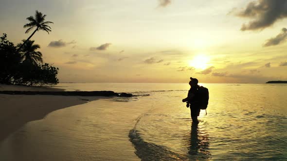 One girl tans on exotic tourist beach time by transparent lagoon with white sand background of the M