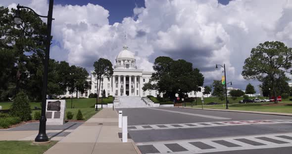 Alabama state capitol in Montgomery with gimbal video walking forward on street level.