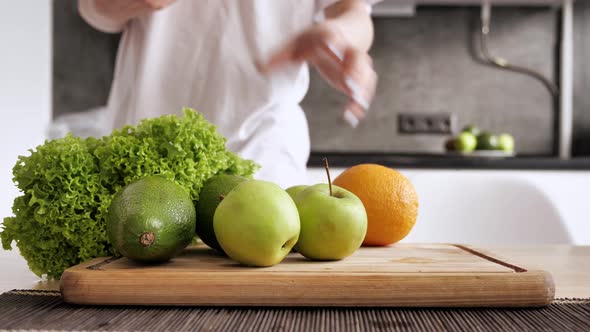 Woman Was Picking an Oranges and Using a Knife for Cut the Orange 