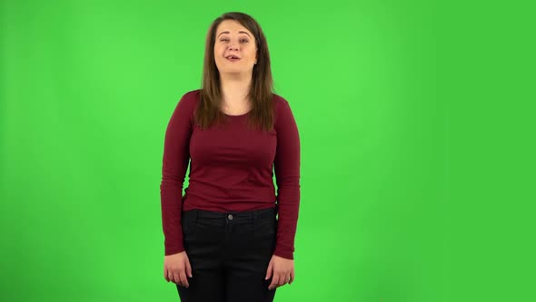 Pretty Girl Says Wow, Waves Her Head Approvingly, Green Screen