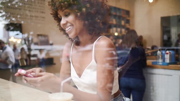 woman in a cafè window