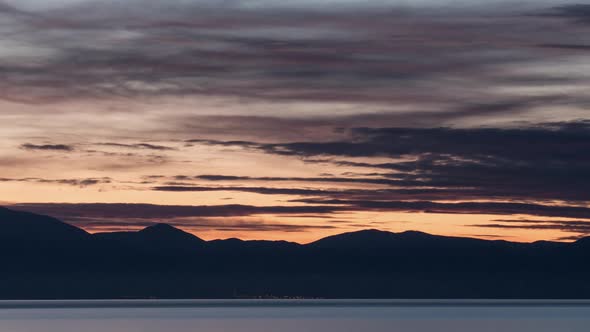 Timelapse of Night Coming To Coastal Town