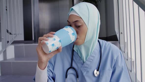 Medical professional working at a hospital alt