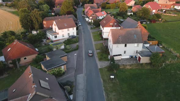 Drone Shoot following a Car in the urban village