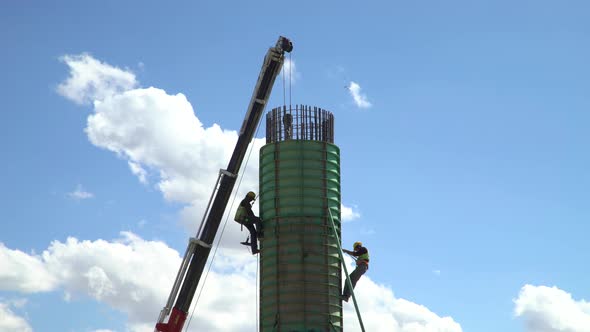 Construction Workers And Sky