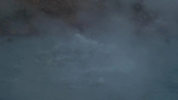 dramatic iceland landscape, geothermal hot spring pool steam smoke rising, beautiful relaxing nature