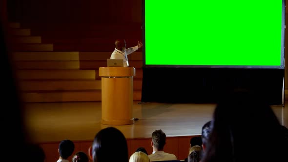 Mature African american businessman giving presentation in a business seminar 4k