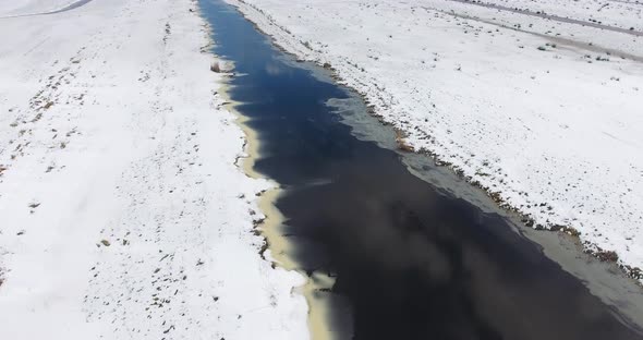 Aerial view of marshland covered with snow in The Netherlands.