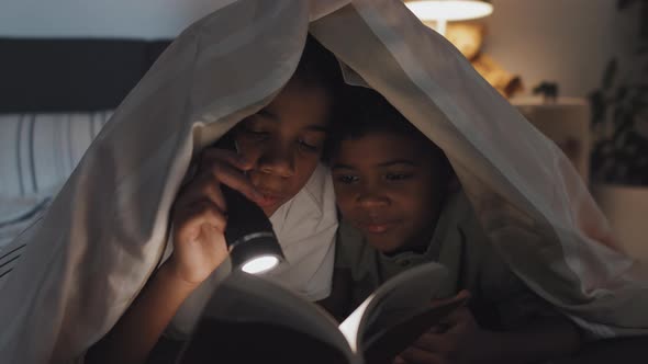 Kids Reading Book with Flashlight