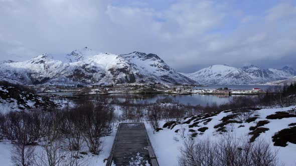 Low aerial revealing shot on a scenic winter day, Sildpollnes in Lofoten, Norway.