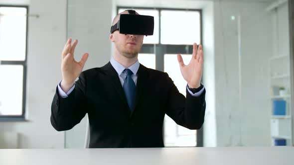 Businessman with Virtual Reality Headset at Office 13