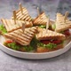 Tasty and Fresh Club Sandwich Served on White Ceramic Plate - VideoHive Item for Sale