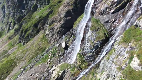 Aerial view of a waterfall in the mountains