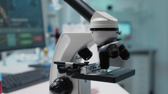 Close Up of Scientific Microscope in Laboratory Using Optical Lens