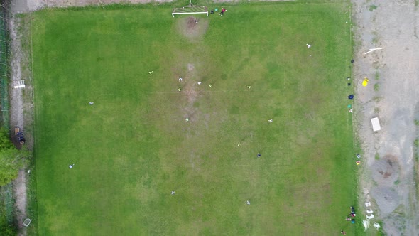 Players of Football Club Training Outdoors