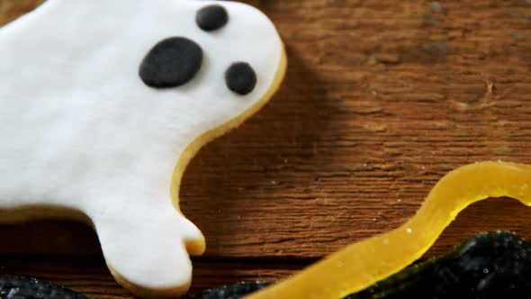 Gingerbread cookie and other sweet foods on a wooden table 4k