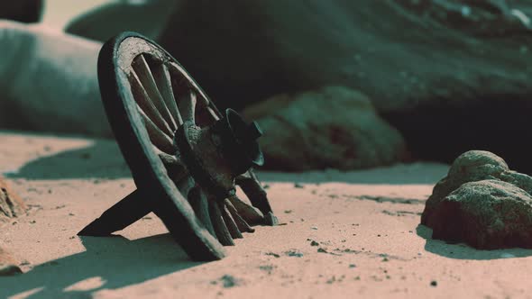 Old Wooden Cart Wheel at Sand Beach