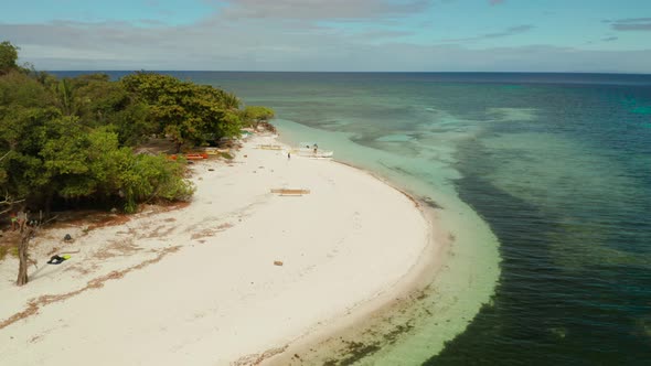 Tropical Island with Sandy Beach. Mantigue Island, Philippines