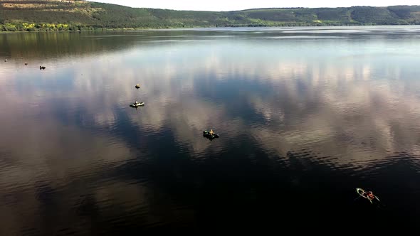 aerial view of fisherman at the boat on river. Fisherman life style.