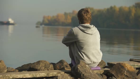 Male Tourist Watching Ship Sailing, Tired of Routine, Dreaming About Travelling