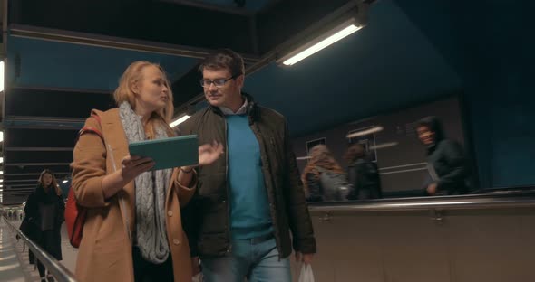 People in Pedestrian Tunnel of Stockholm Subway