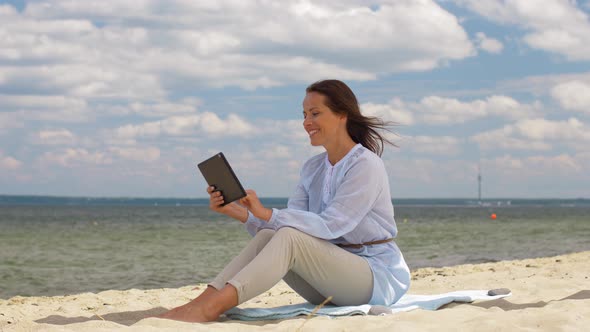 Happy Smiling Woman with Tablet Pc on Summer Beach 21