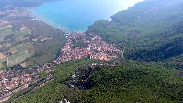 A Small City on a Forested Bay and Fertile Alluvial Plain by the Sea