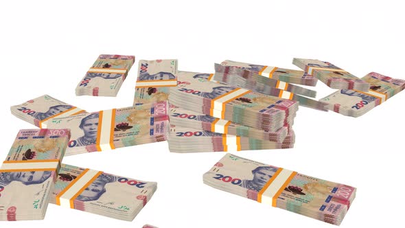 Many wads of money falling on table. 200 Ukrainian hryvnia banknotes. Stacks of money.