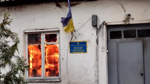 Administration Building with Ukrainian Flag Burns in Village