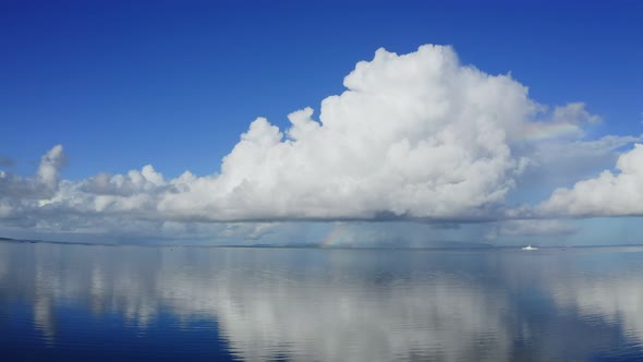 Blue sky and sea with rainbow in ishigaki island