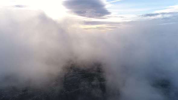 Drone Flies in the Clouds