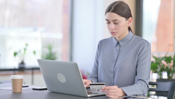 Successful Online Shopping on Laptop By Young Latin Woman